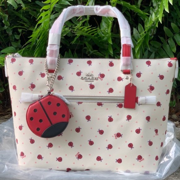 coach ladybug camera bolsa